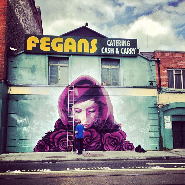 Beautiful street art being done on the Luas red line